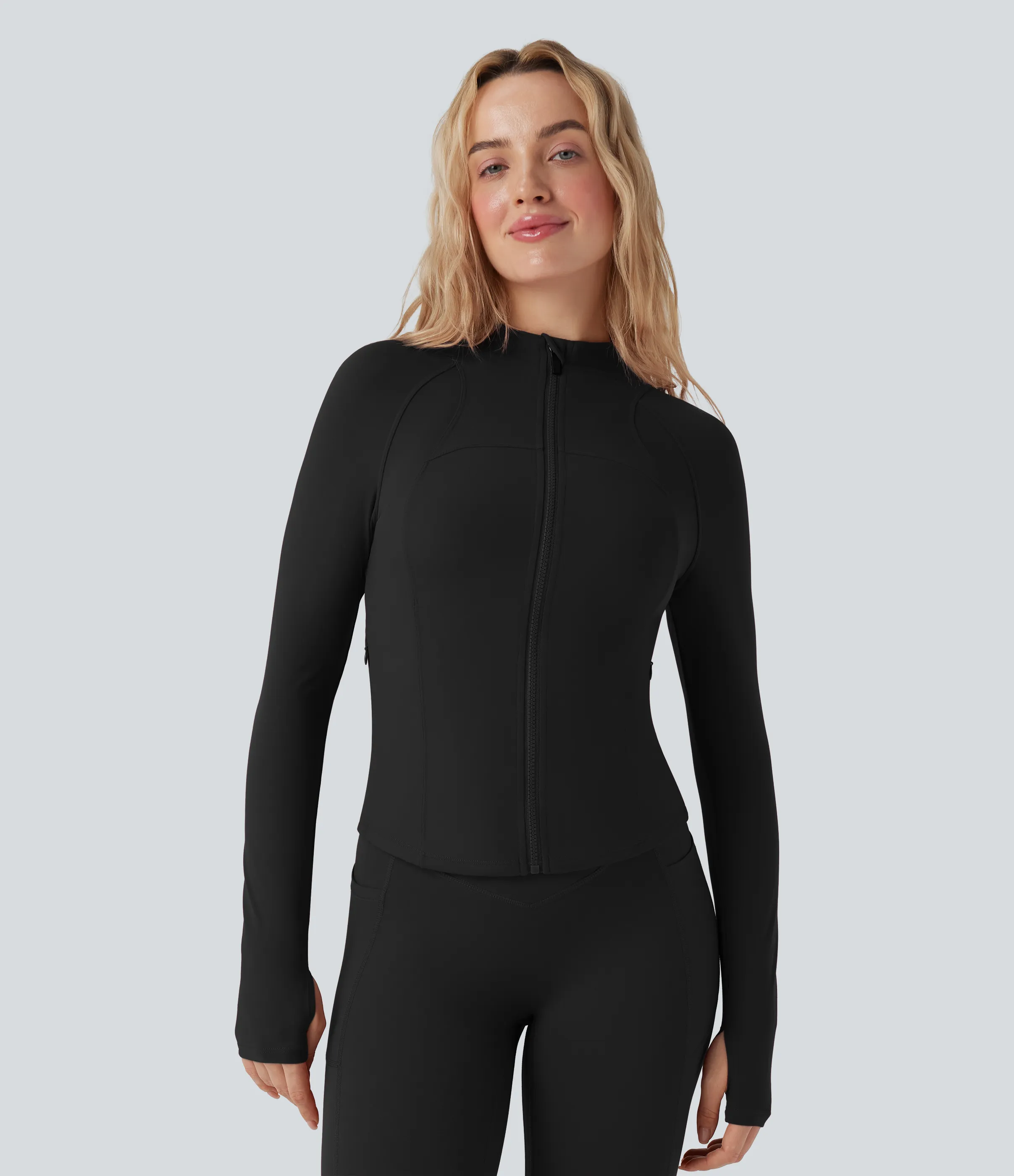 Halara Chaqueta de yoga UltraSculpt™ de manga larga con cuello alto y abertura para el pulgar con bolsillos - Black - S sold by Halara product image thumbnail 4