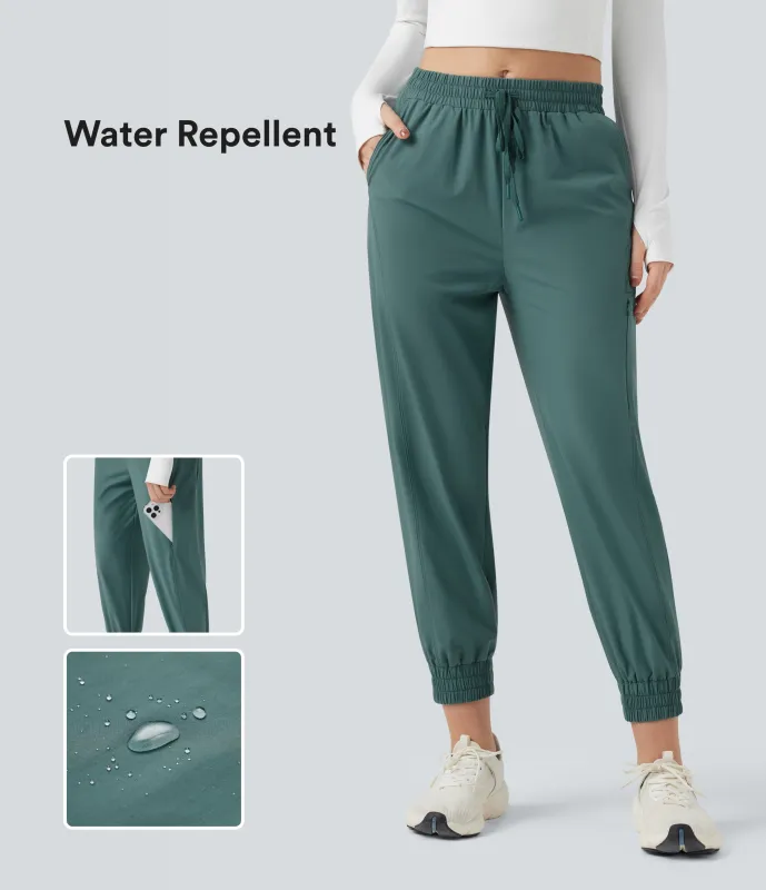 Halara Pantalones deportivos de senderismo de tiro medio resistentes al agua y al desgaste con cordón y bolsillos - Blue Spruce - L(regular) sold by Halara