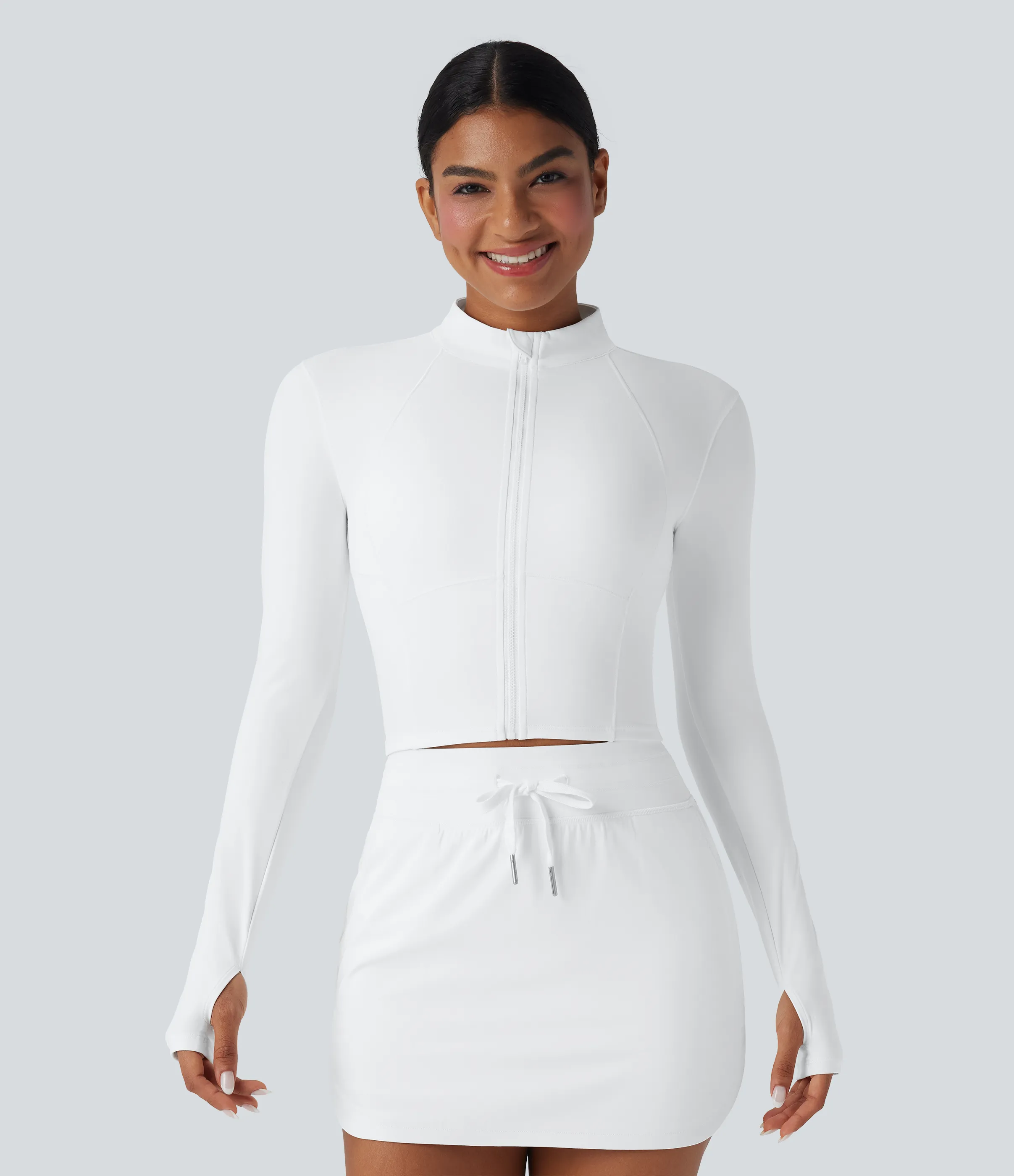 Halara Chaqueta de golf corta SoftlyZero™ con cuello alto afelpado y aberturas para los pulgares y cremallera - White - L sold by Halara