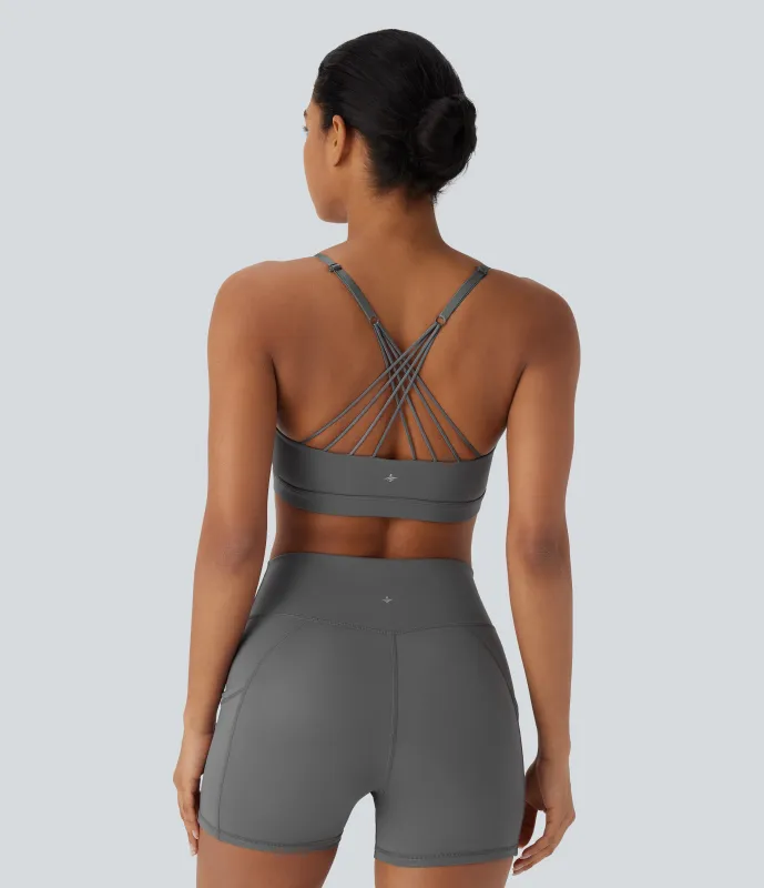 Halara Sujetador deportivo de yoga de secado rápido con tirantes ajustables cruzados y espalda abierta de piel sintética de sujeción baja - Steel Gray - XL sold by Halara