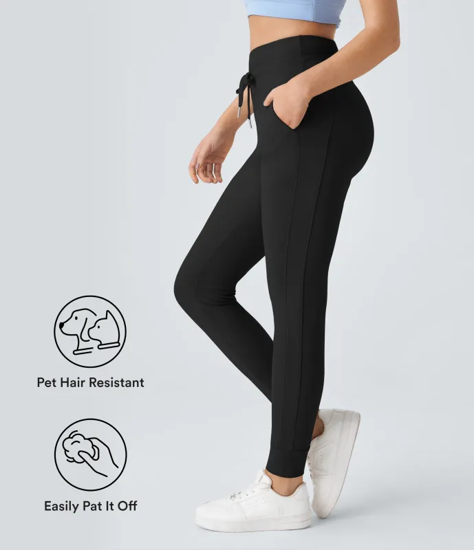 Halara Joggers Patitoff™ Flow liso largo completo bolsillo lateral cordón ajuste tiro alto resistente pelo mascota - Black - XS sold by Halara