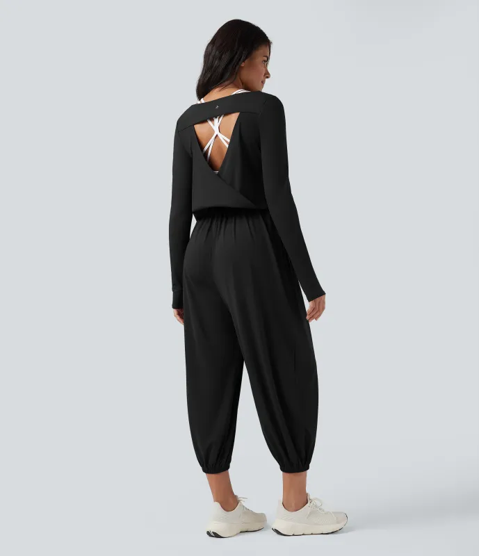 Halara Jumpsuit de yoga SoftlyZero™ de manga larga con aberturas en la espalda y bolsillos con aberturas para los pulgares - Easy Peezy - Black - L(regular) sold by Halara