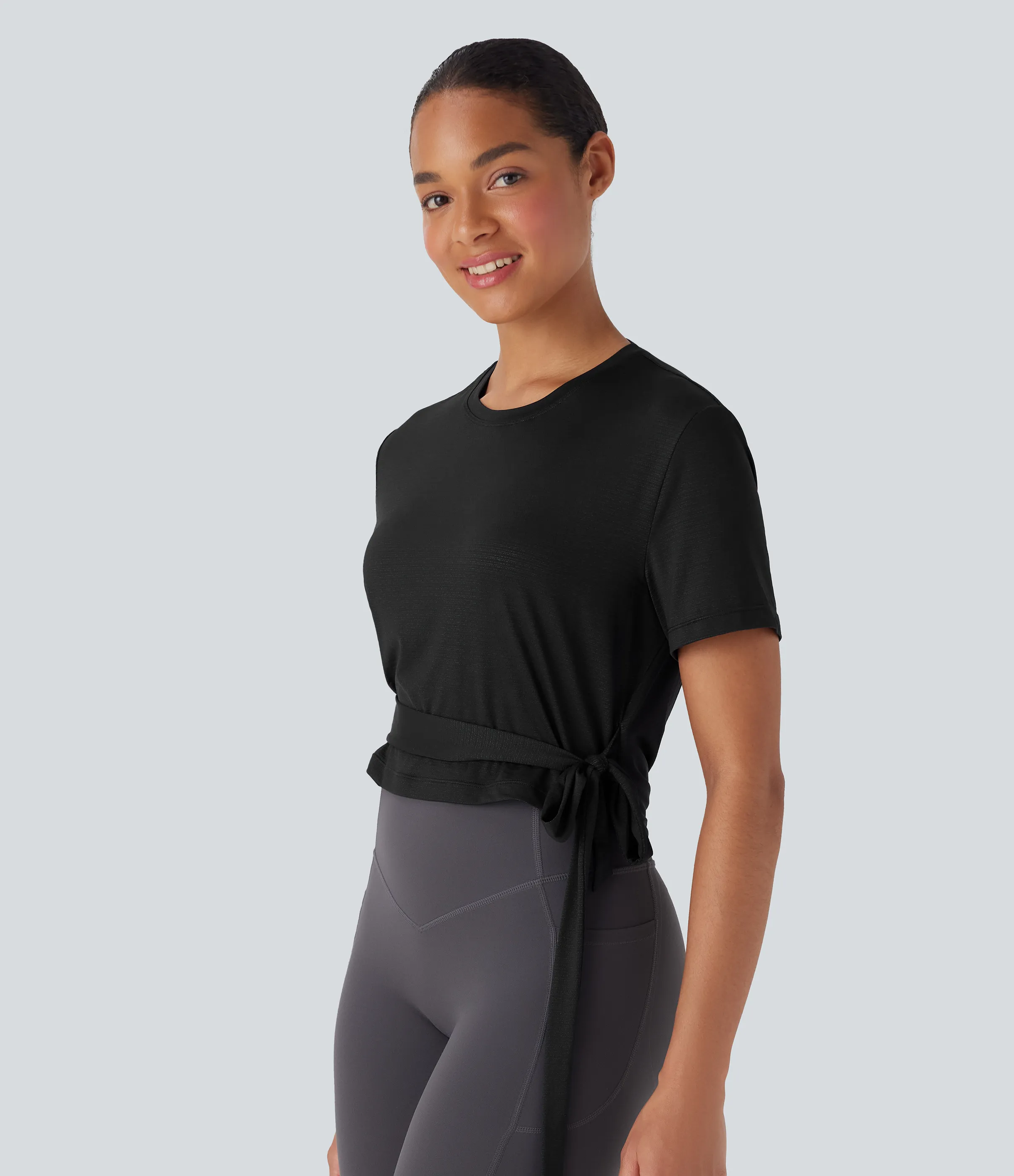 Halara Top deportivo de yoga de manga corta con cuello redondo, espalda abierta y lazo lateral - Black - S sold by Halara product image thumbnail 4