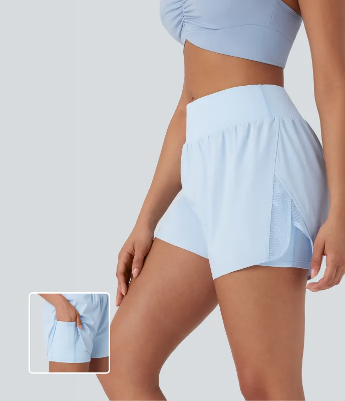 Halara Shorts de yoga 2 en 1 de tiro medio con malla en contraste y bolsillos - Clear Water Blue - L sold by Halara
