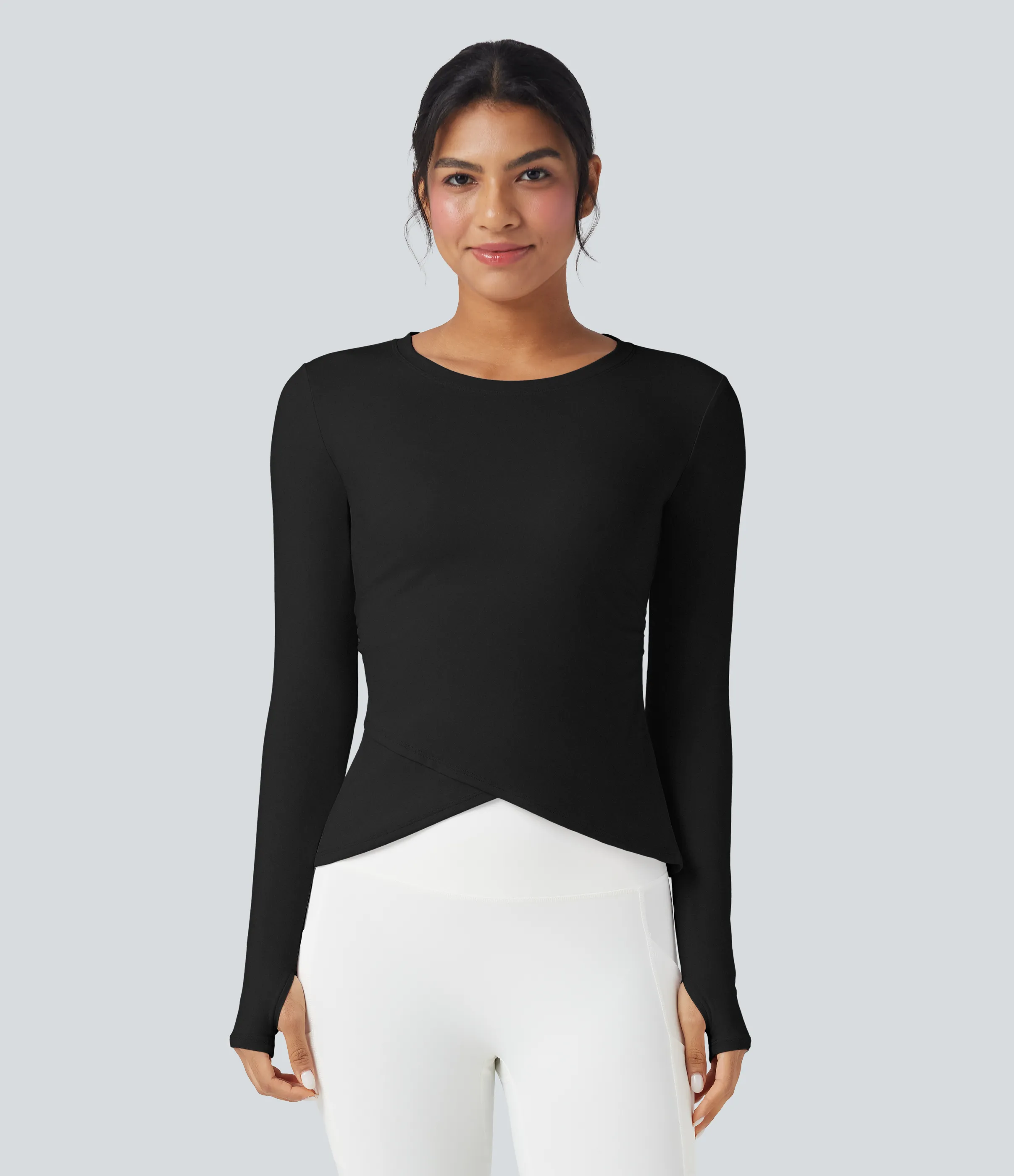 Halara Top deportivo de yoga SoftlyZero™ manga larga afelpada con cuello redondo y aberturas para los pulgares con dobladillo cruzado - Black - S sold by Halara