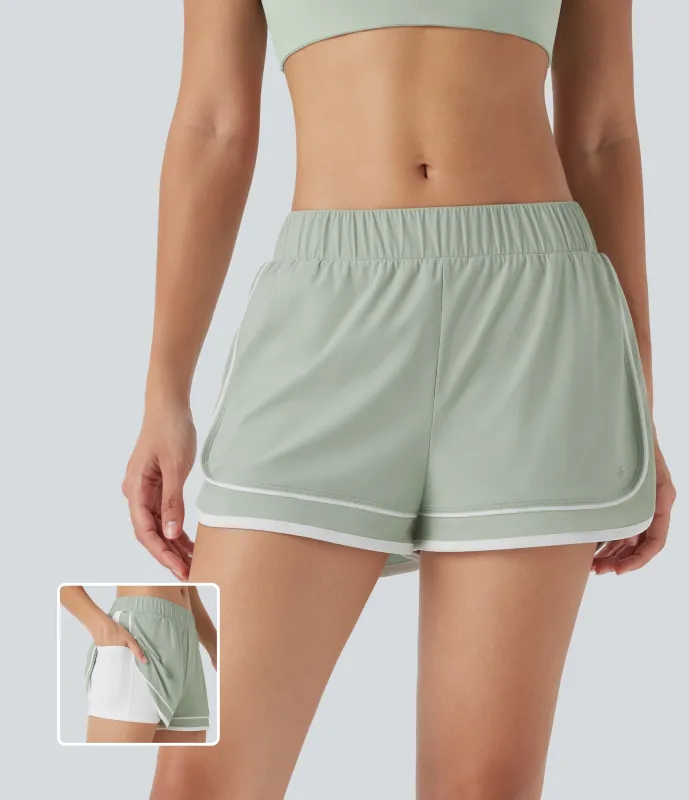 Halara Shorts de running 2 en 1 con secado rápido de tiro bajo y bloques de color con dobladillo curvo y bolsillo - Sea Foam - S sold by Halara