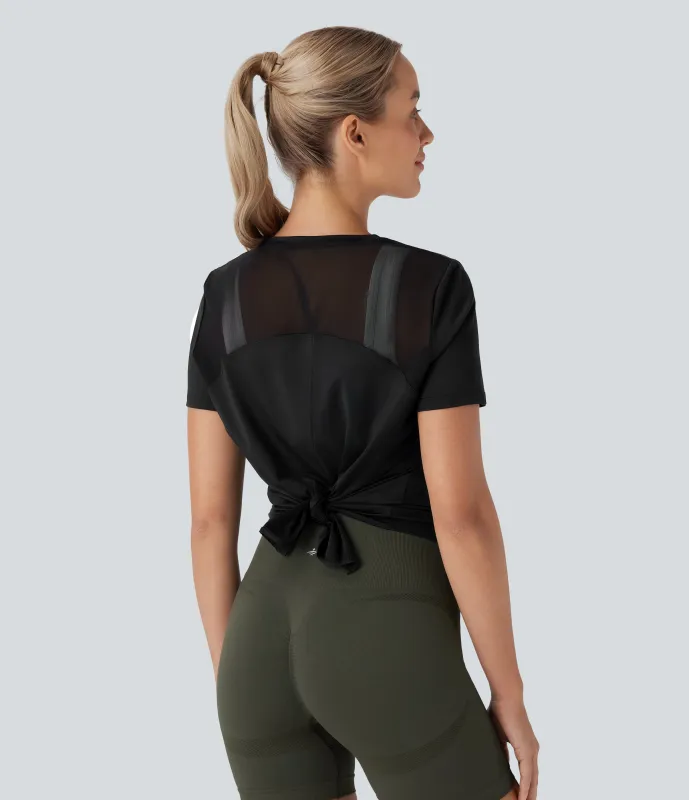 Halara Top deportivo de yoga de manga corta con cuello redondo y malla en contraste con espalda abierta - Black - XS sold by Halara