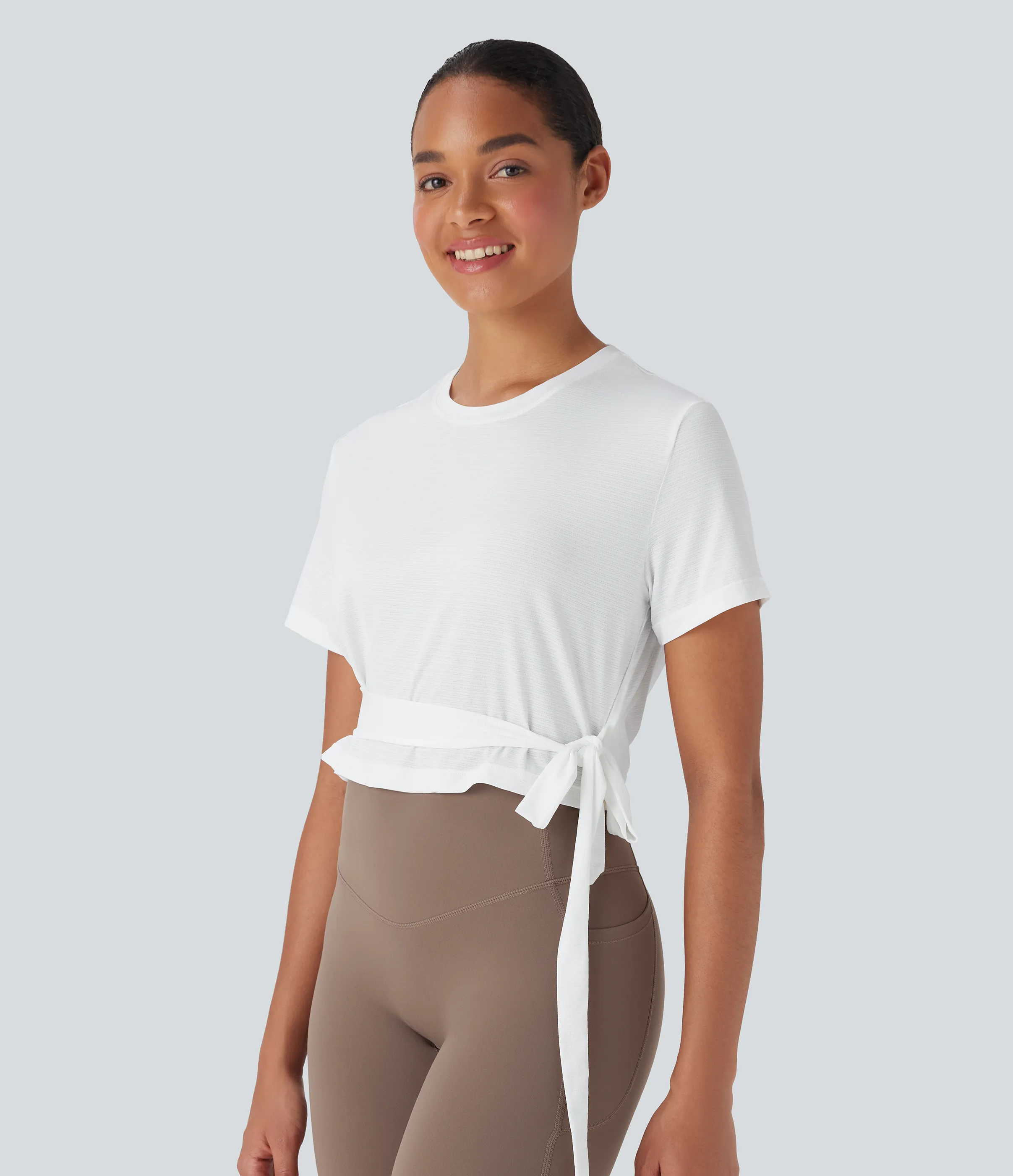 Halara Top deportivo de yoga de manga corta con cuello redondo, espalda abierta y lazo lateral - White - XS sold by Halara product image thumbnail 4