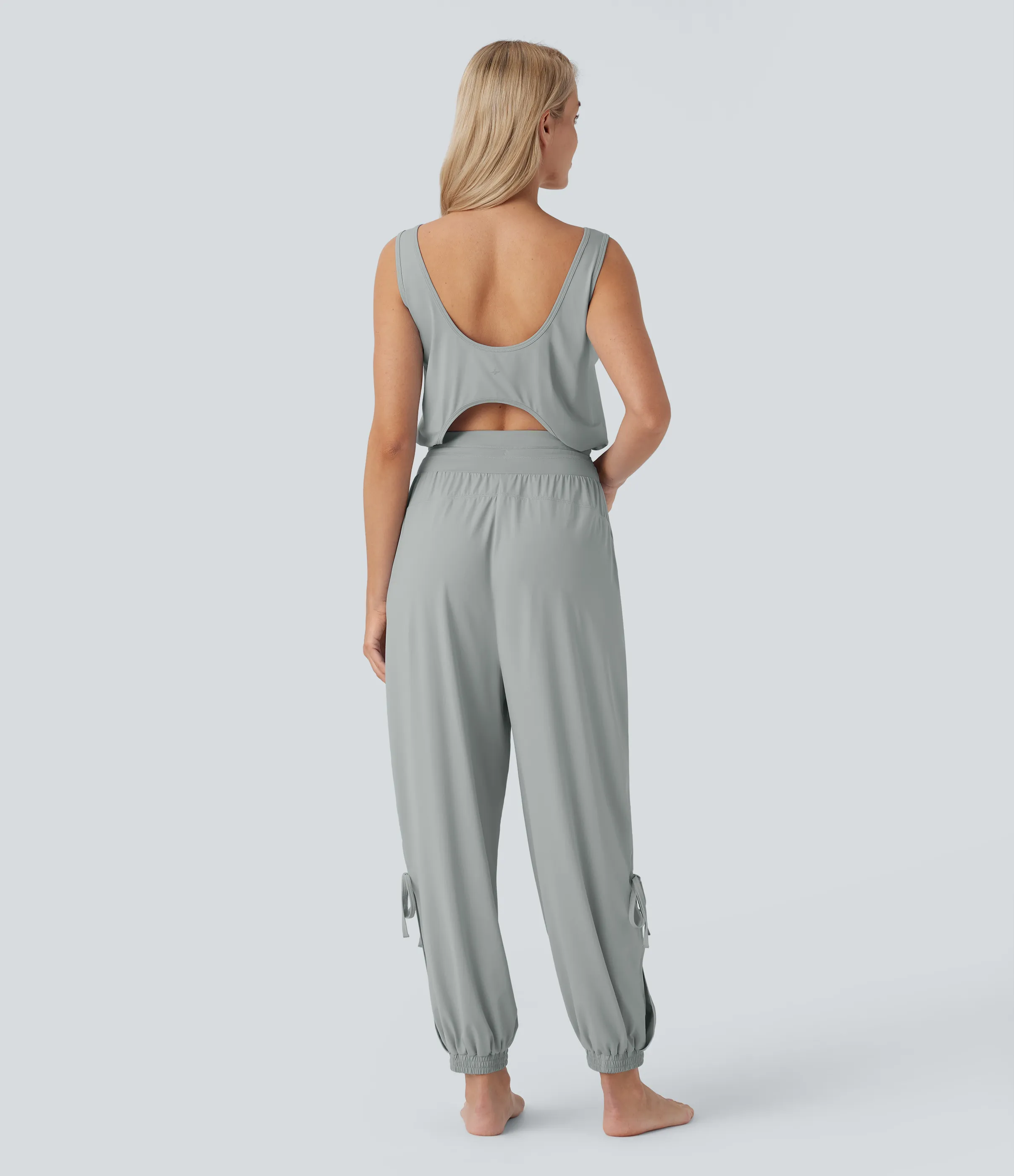 Halara Jumpsuit de yoga sin mangas con espalda descubierta, cordón ajustable y bolsillos laterales de tacto fresco - UPF50+ - Mirage Gray - L(regular) sold by Halara