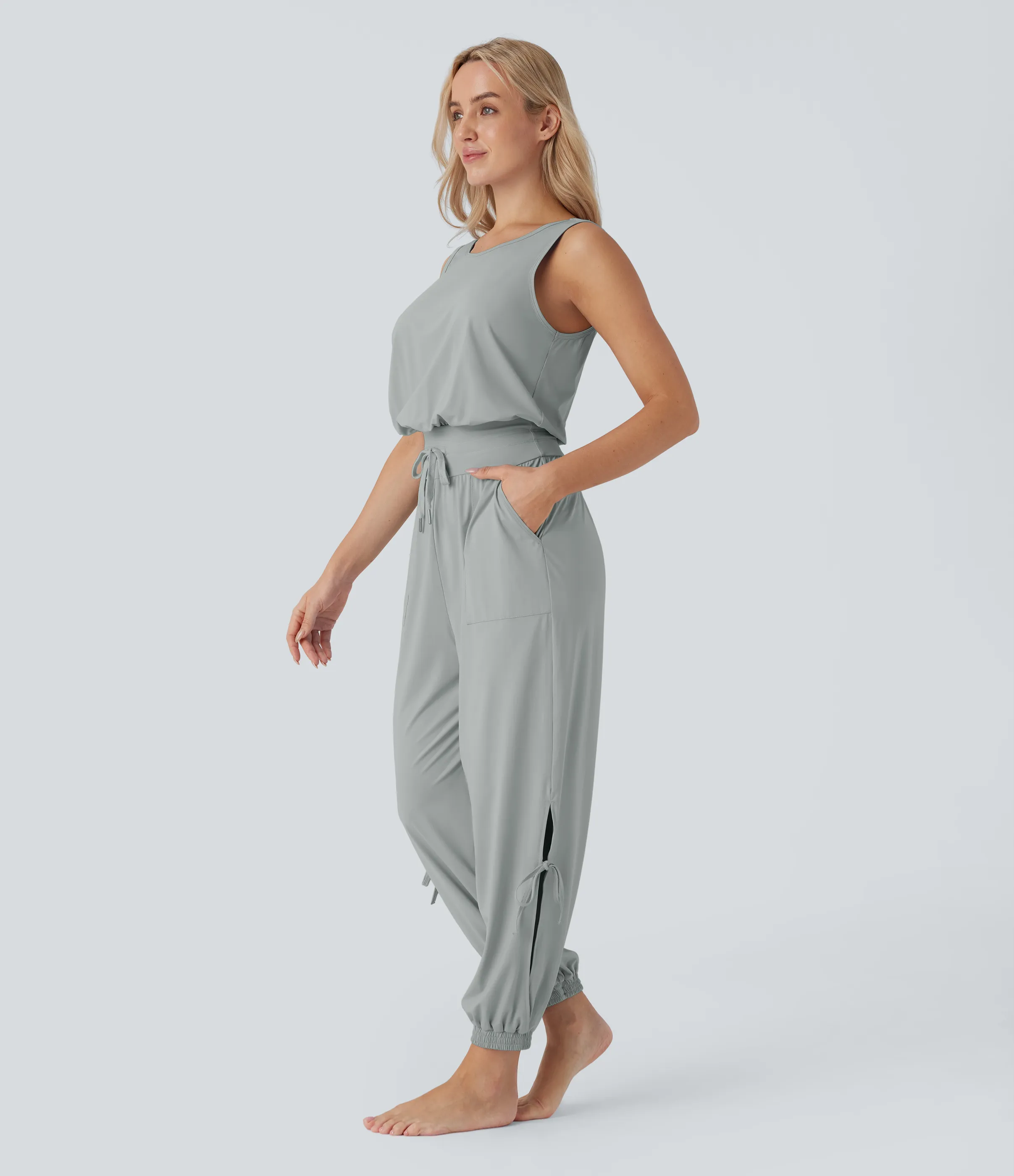 Halara Jumpsuit de yoga sin mangas con espalda descubierta, cordón ajustable y bolsillos laterales de tacto fresco - UPF50+ - Mirage Gray - L(regular) sold by Halara product image thumbnail 4