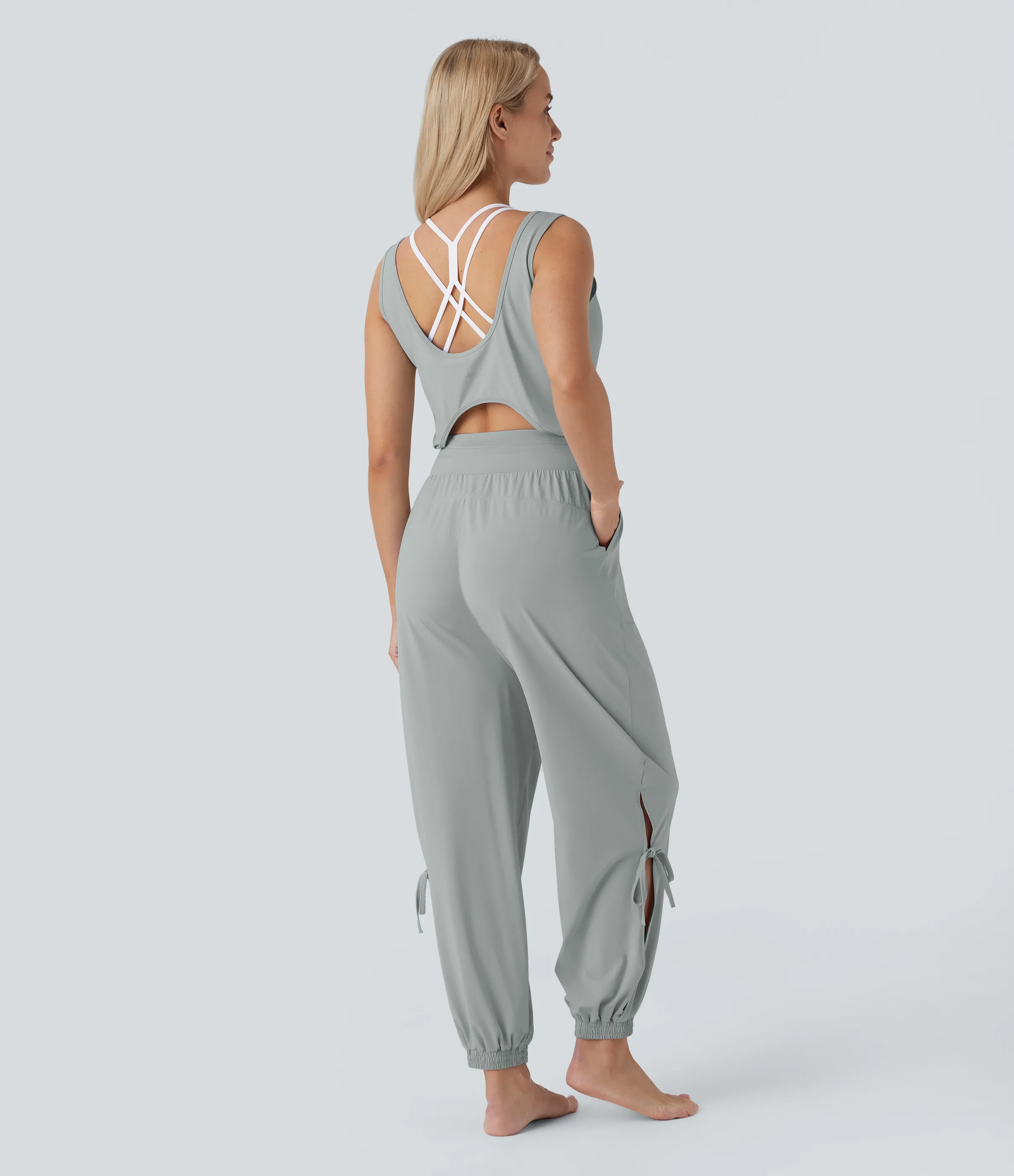 Halara Jumpsuit de yoga sin mangas con espalda descubierta, cordón ajustable y bolsillos laterales de tacto fresco - UPF50+ - Mirage Gray - L(regular) sold by Halara product image thumbnail 5