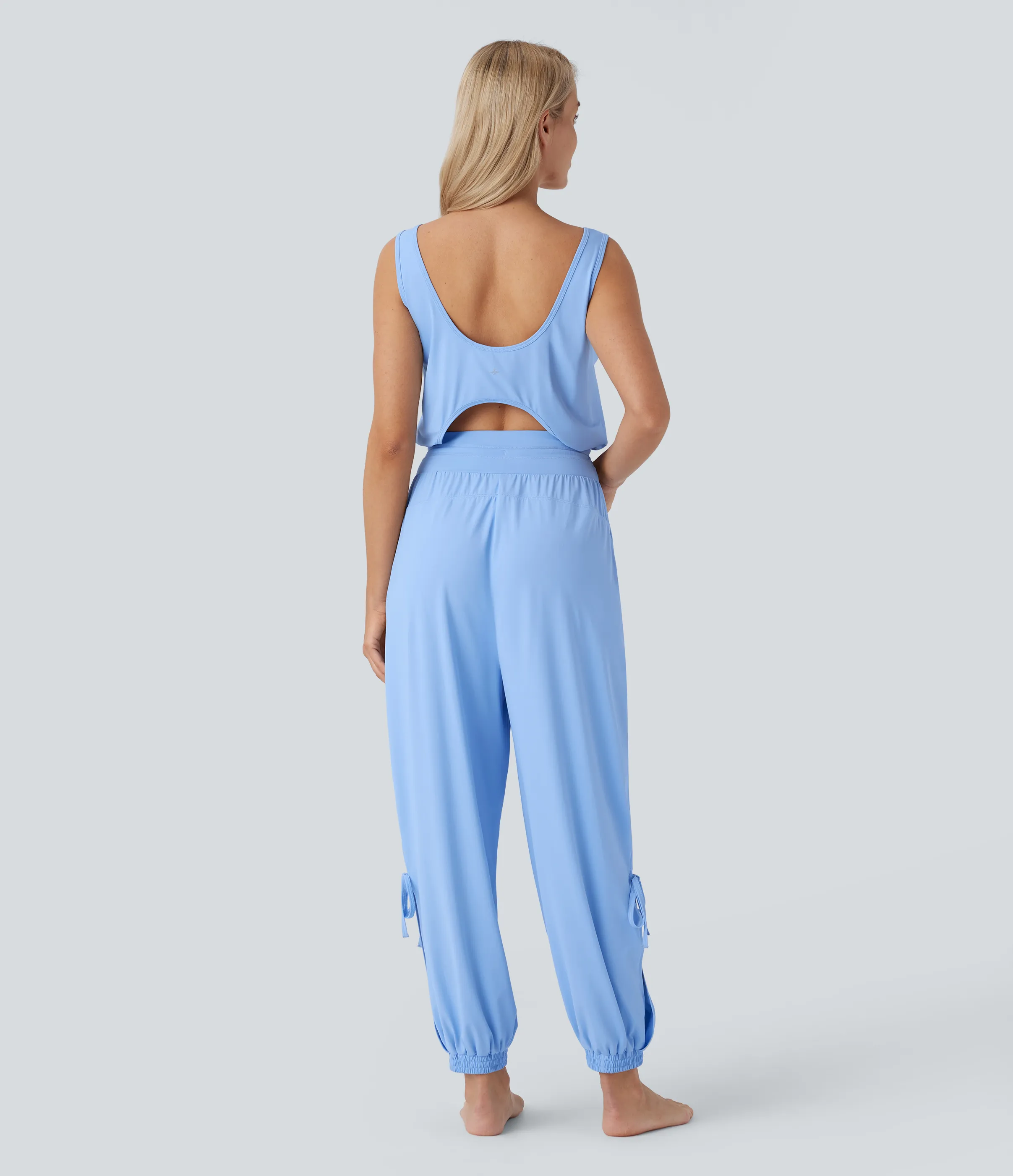 Halara Jumpsuit de yoga sin mangas con espalda descubierta, cordón ajustable y bolsillos laterales de tacto fresco - UPF50+ - Sky Blue - M(regular) sold by Halara