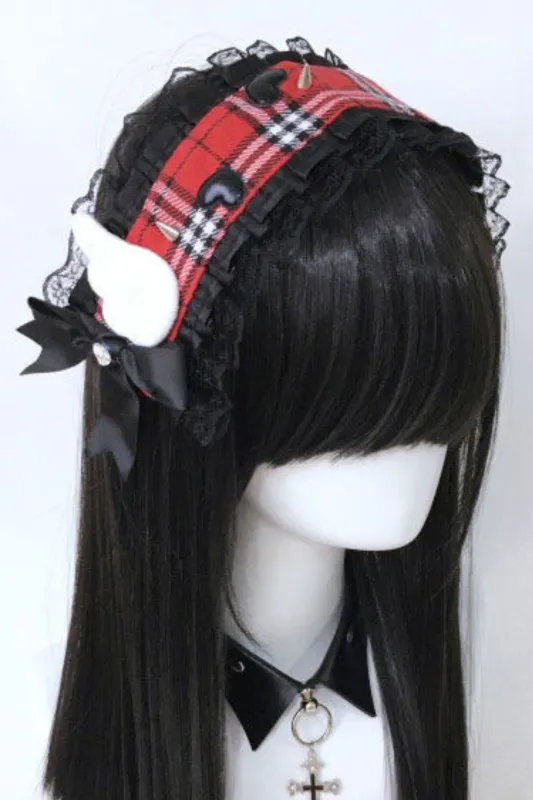 チェックウィングヘッドバンド sold by Belchic