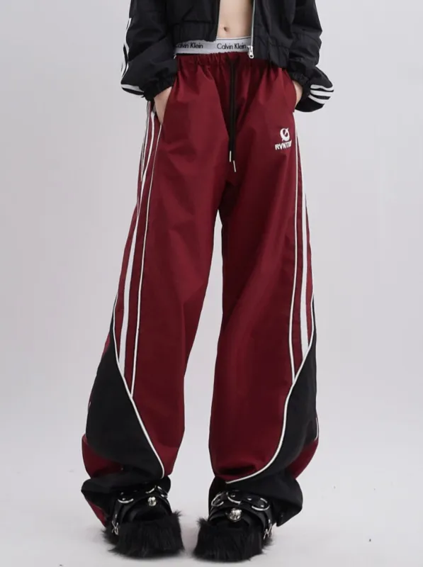 サイドストライプデザインストレートスポーツパンツ sold by Belchic