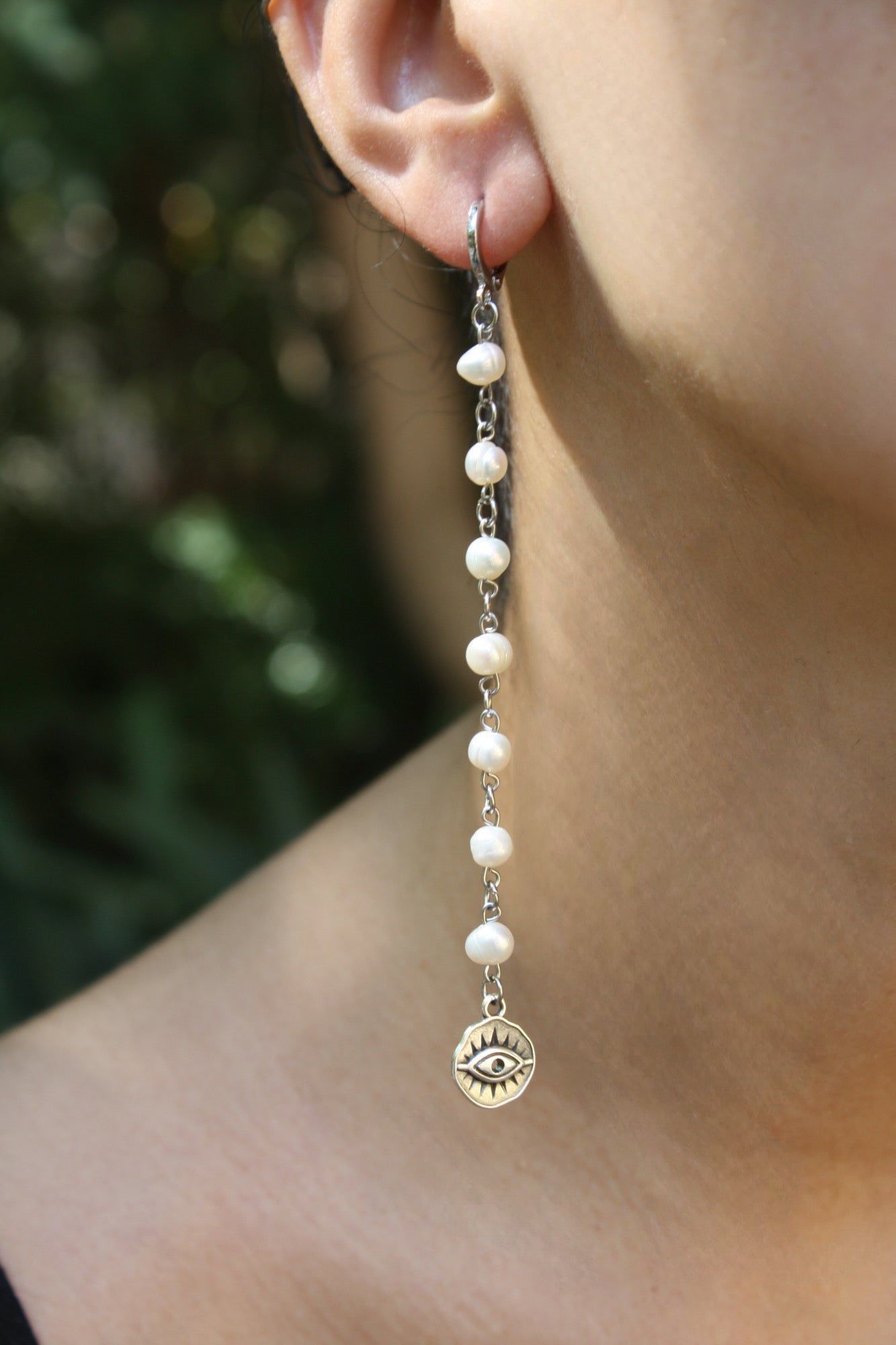Evil Eye Pearl Earrings sold by MHART