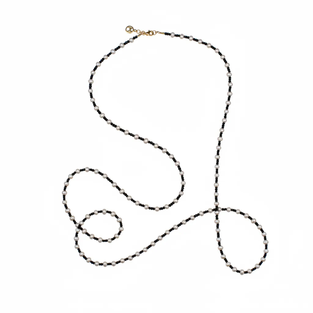 White Pearl and Black Spinel Beaded Necklace sold by MHART