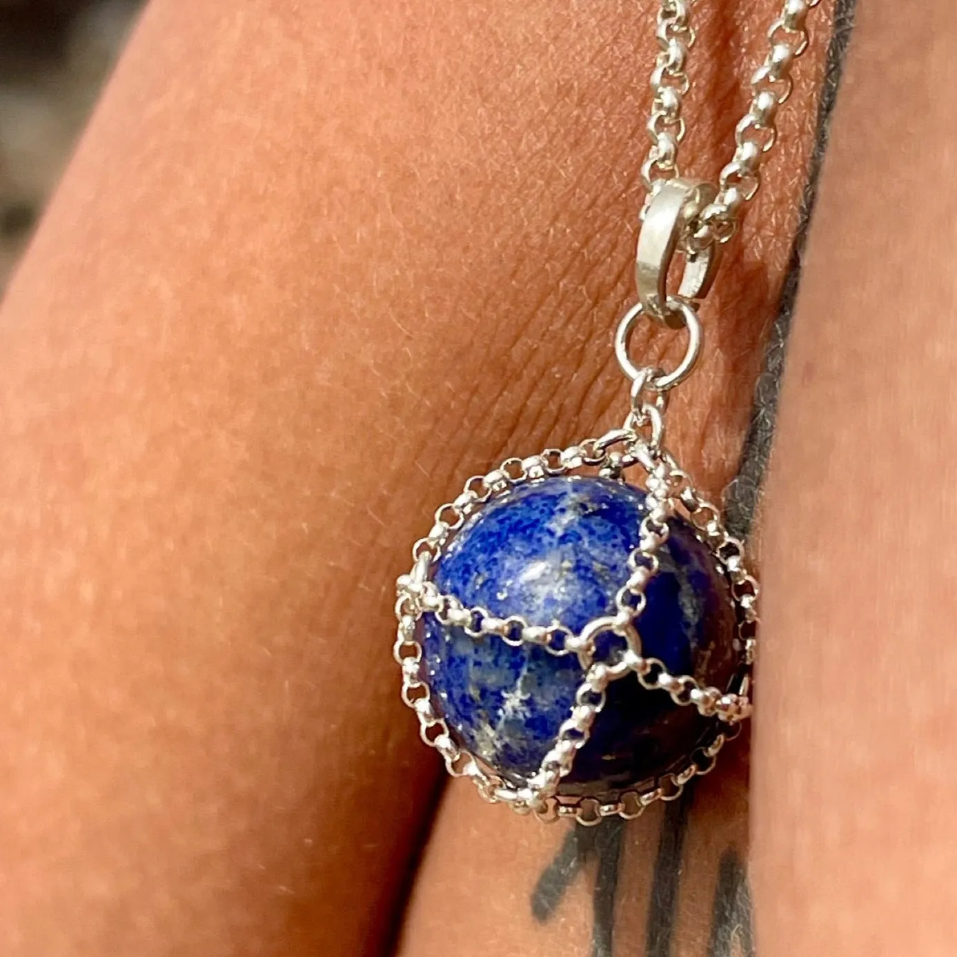 Caged Lapis Sphere Pendant sold by MHART