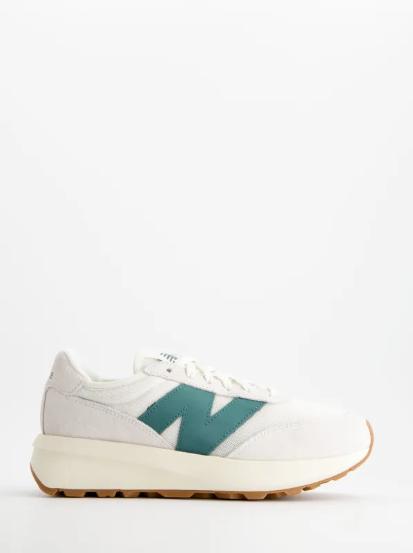 New Balance 370 - Breathable white leather sneakers made by New Balance