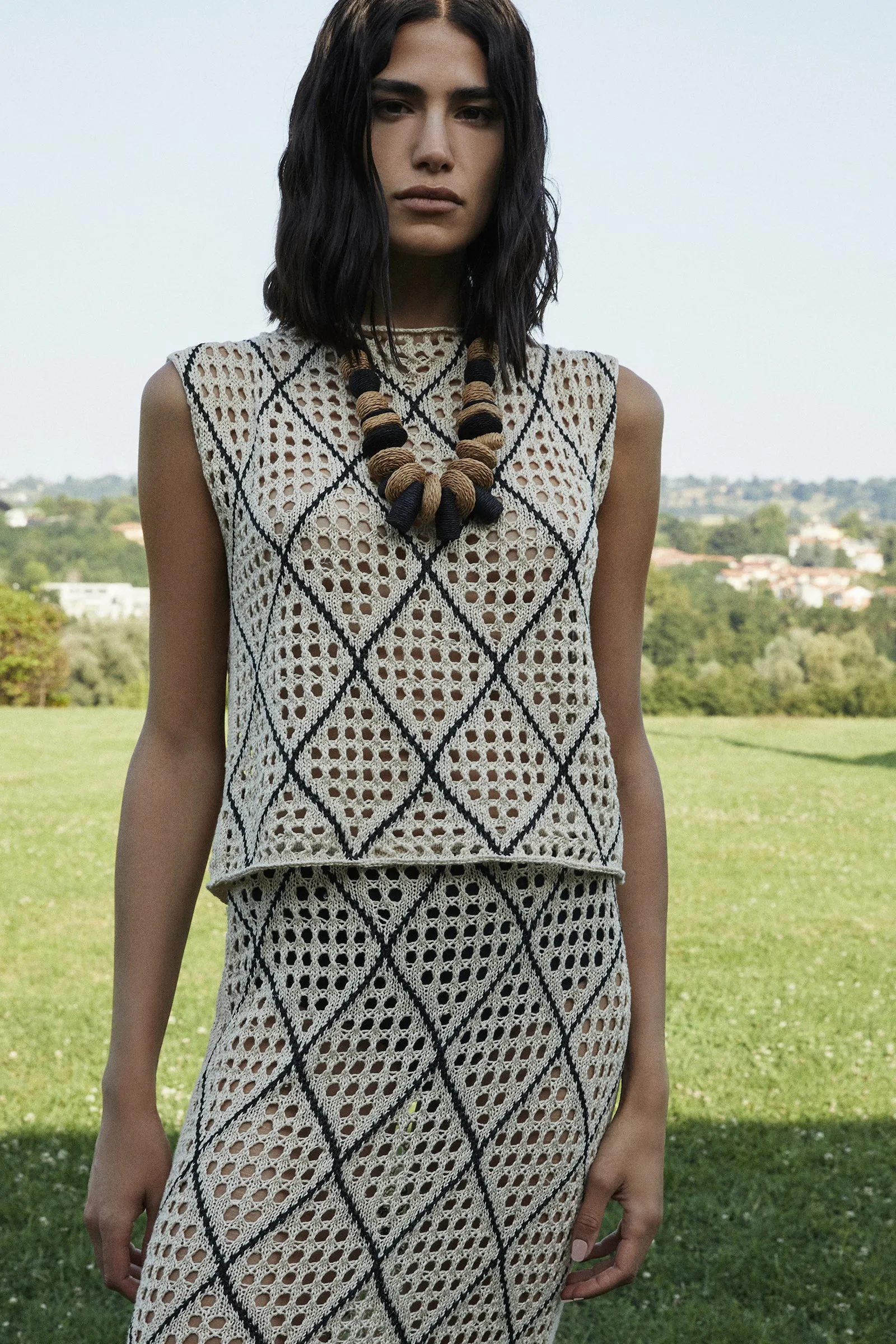 TOP PUNTO TRAFORATO sold by Liviana Conti