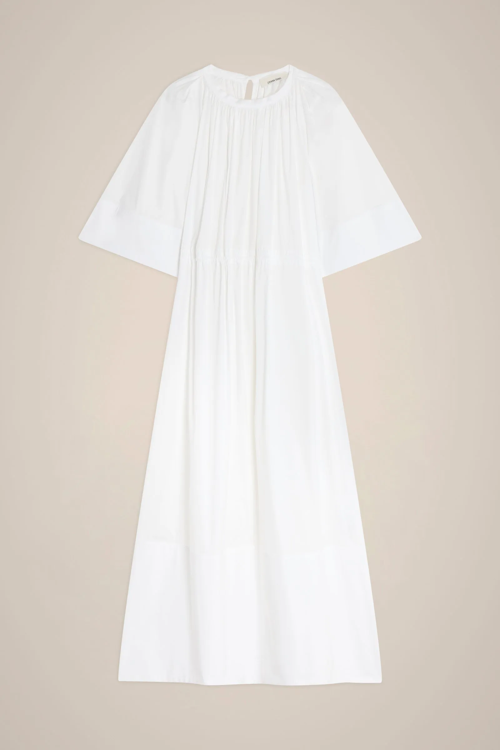 ABITO FORO DIETRO sold by Liviana Conti