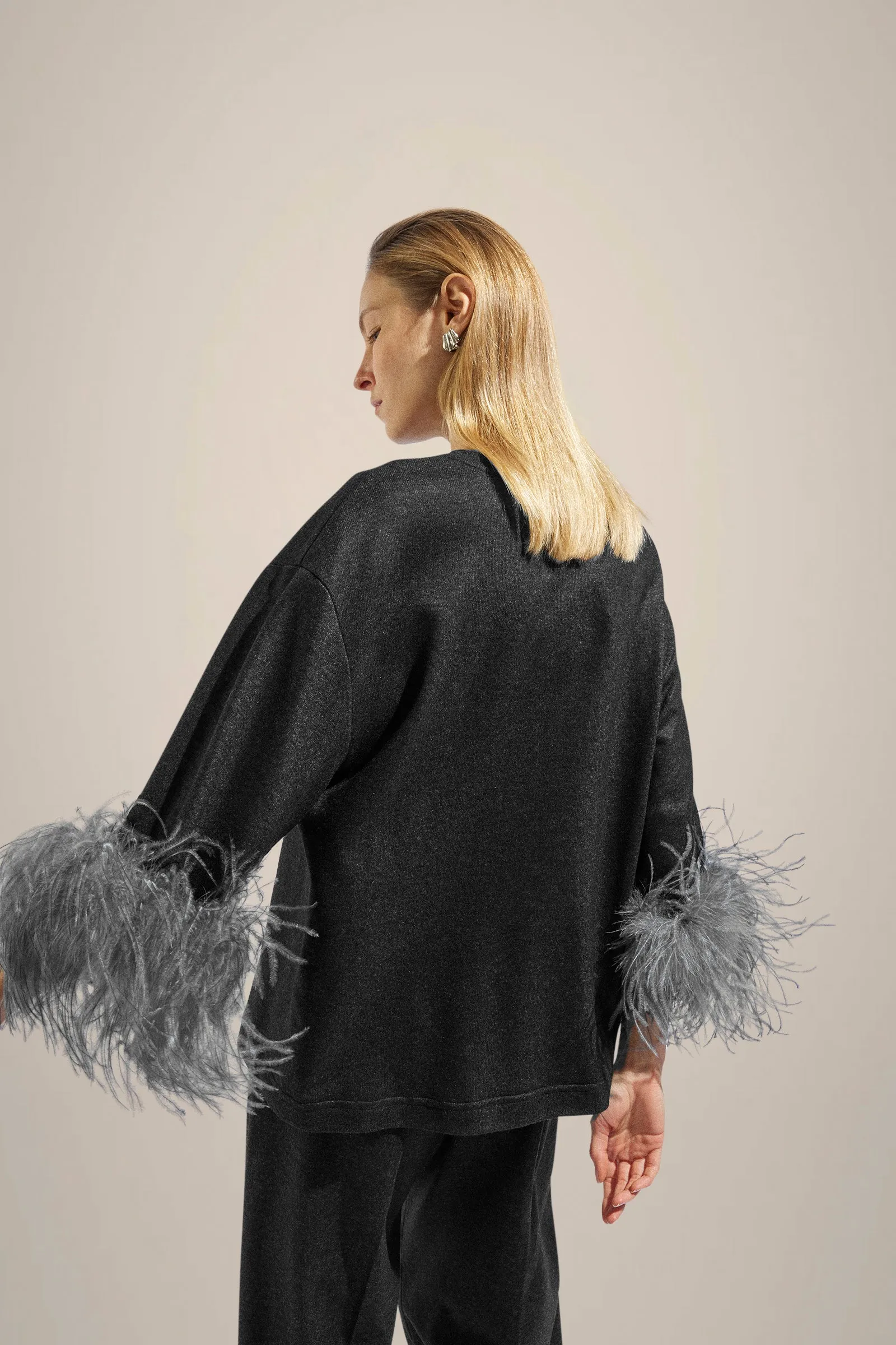 BLUSA CON PIUME sold by Liviana Conti