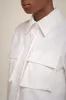 CAMICIA CON TASCHE sold by Liviana Conti