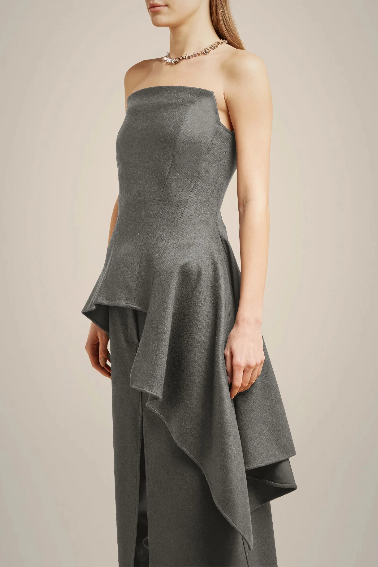 TOP A FASCIA CON ORLO ASIMMETRICO sold by Liviana Conti