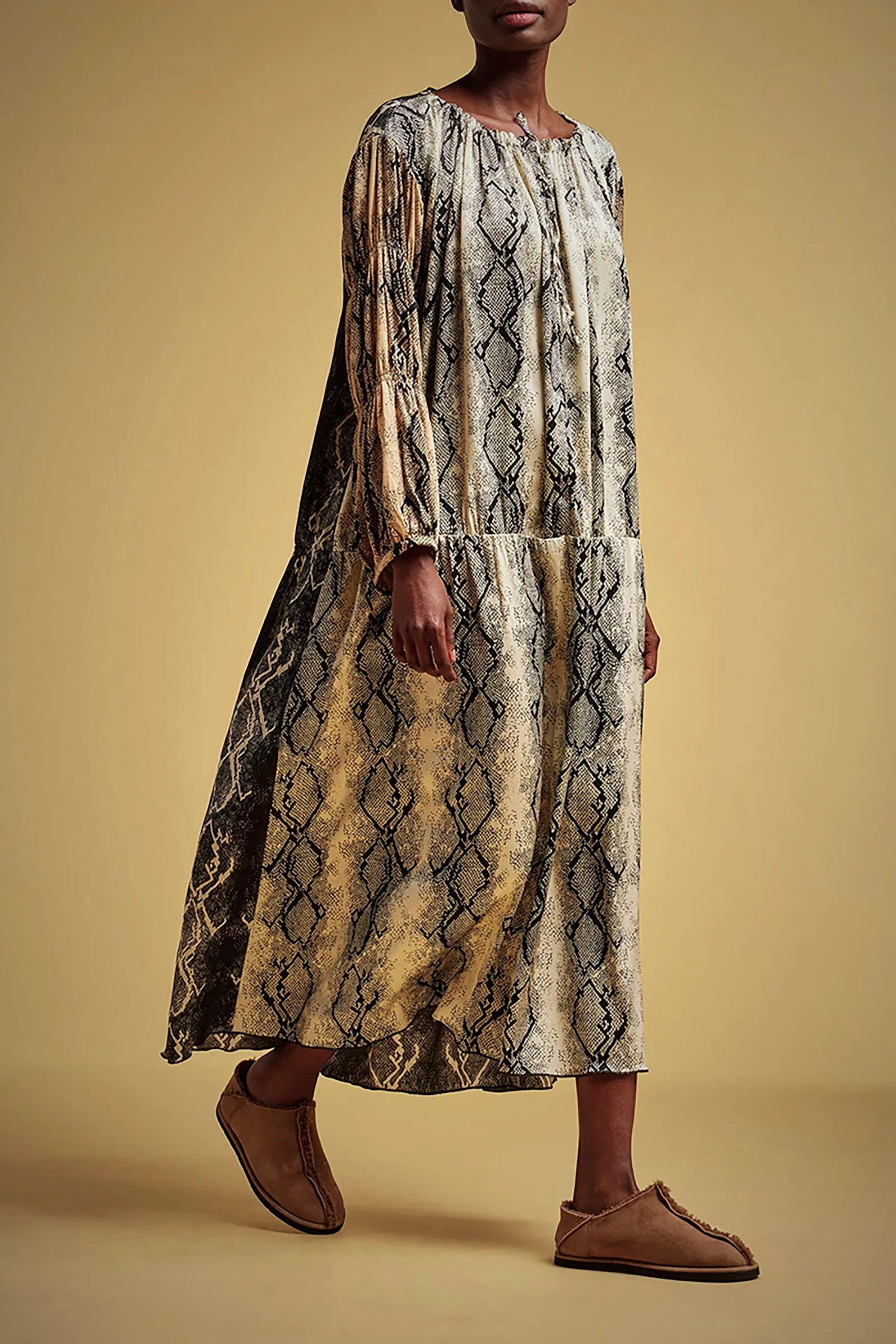 ABITO COULISSE STAMPA PITONE sold by Liviana Conti