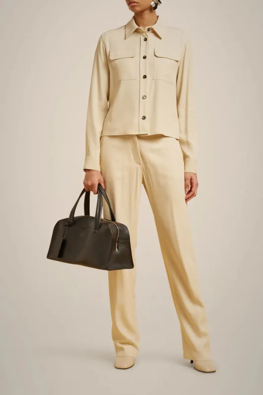 CAMICIA CON TASCHE A TOPPA sold by Liviana Conti