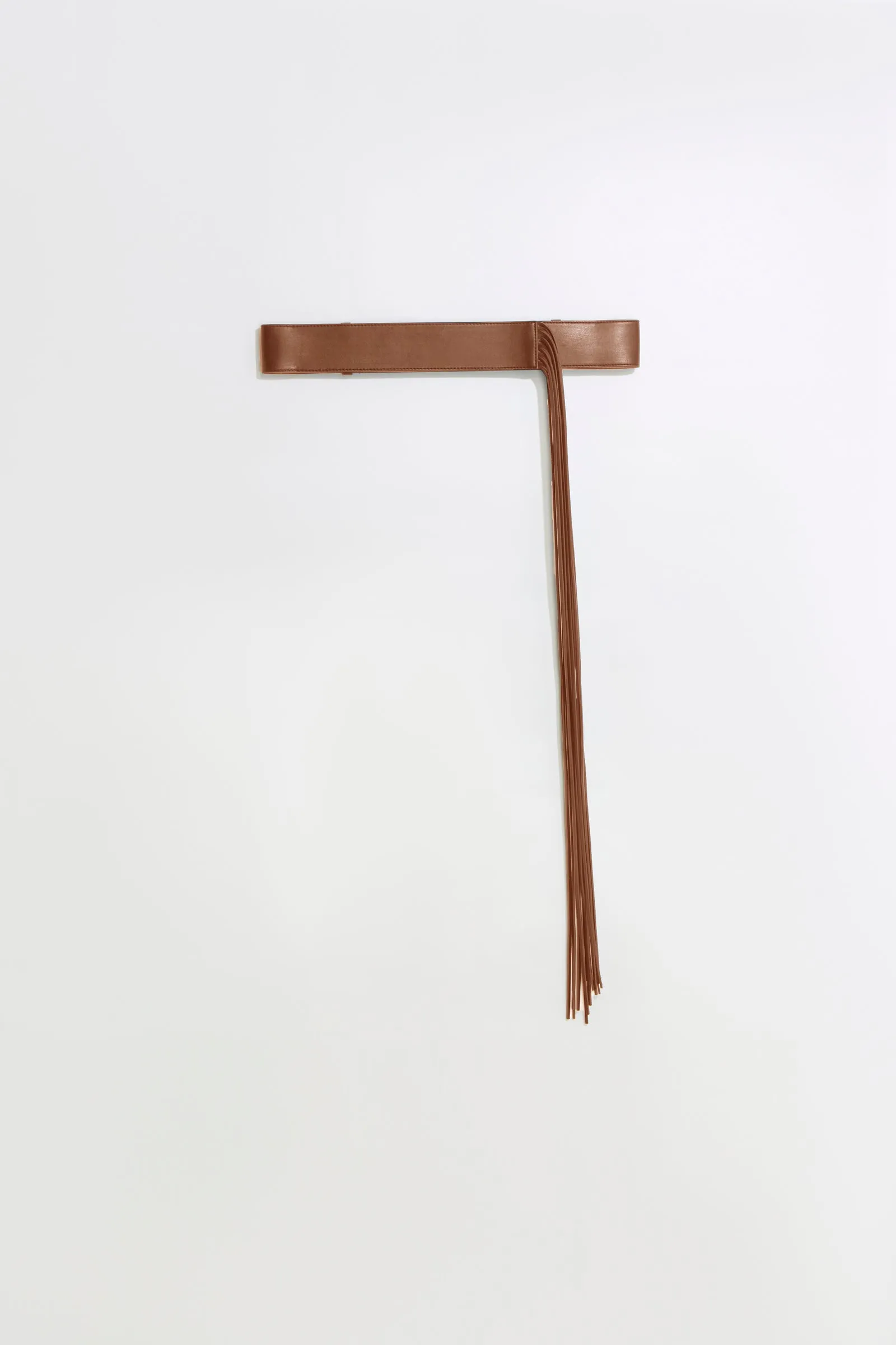 CINTURA CON FRANGE sold by Liviana Conti