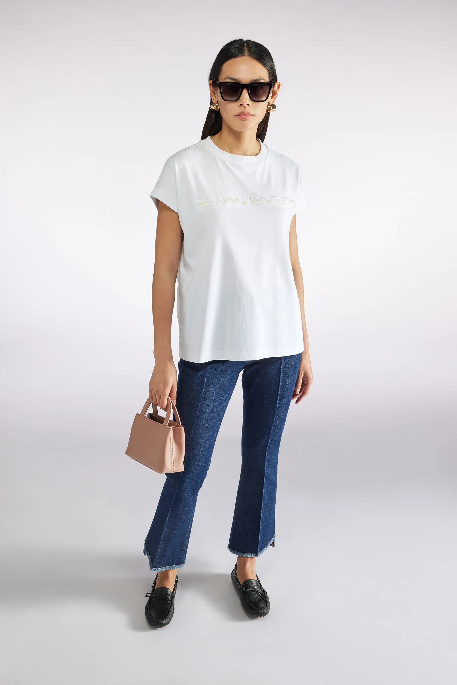 T-SHIRT CON RICAMO sold by Liviana Conti