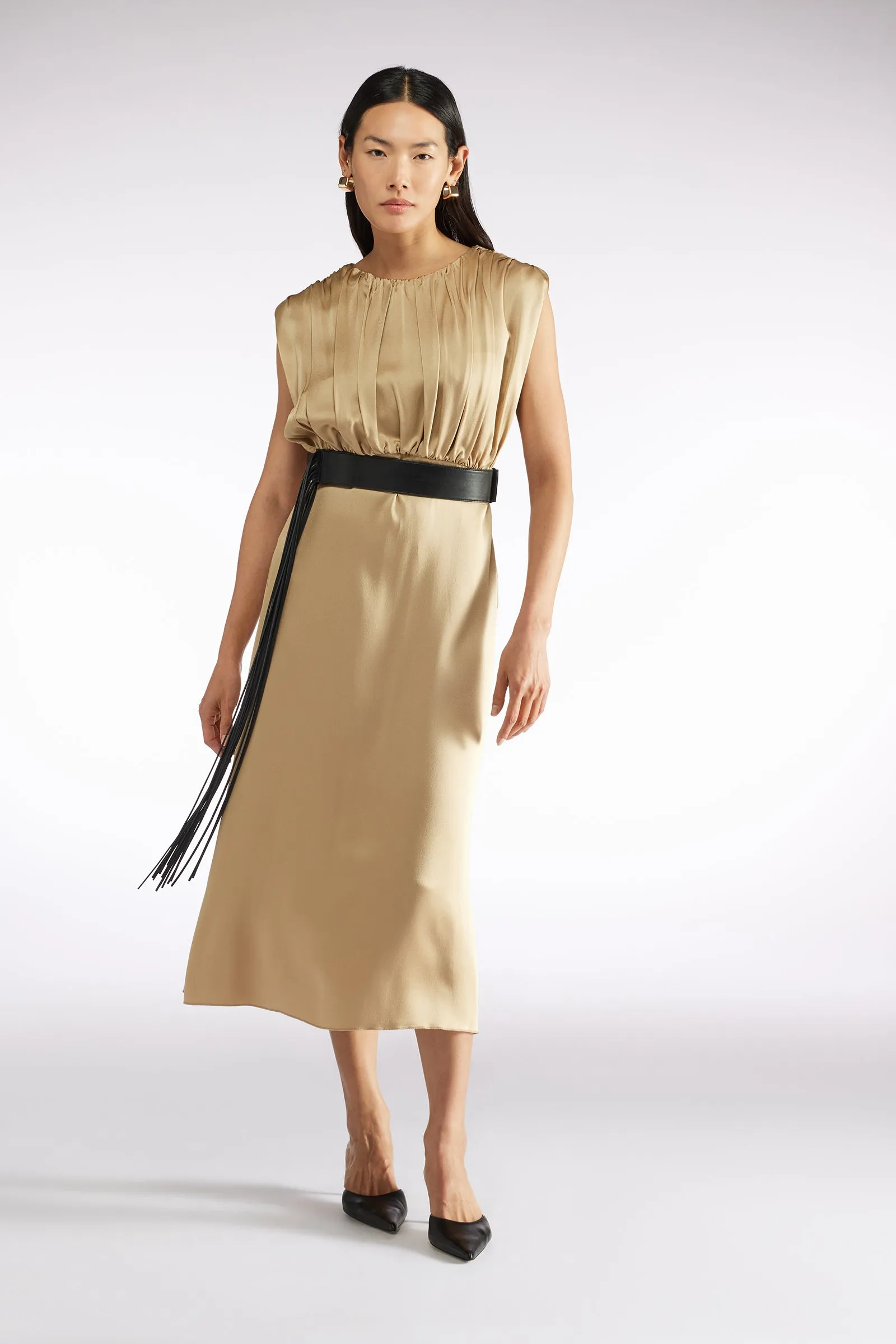 ABITO CON ARRICCI sold by Liviana Conti