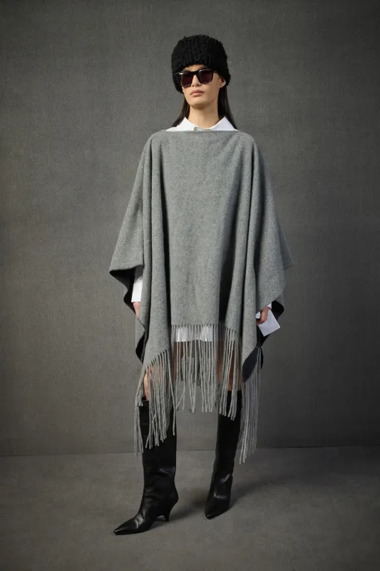 PONCHO BLANCA sold by Liviana Conti