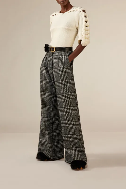 MAGLIA CON TRECCE sold by Liviana Conti