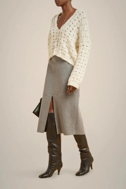 MAGLIA SCOLLO A V PUNTO CANESTRO sold by Liviana Conti