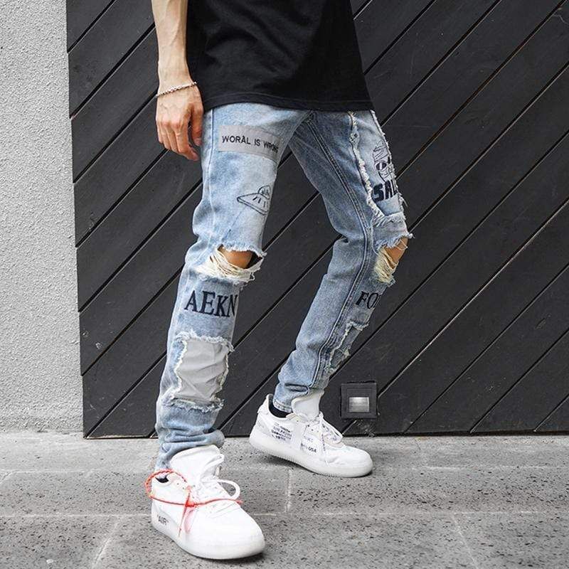 Distressed Graffiti Jeans sold by Yugen Theory