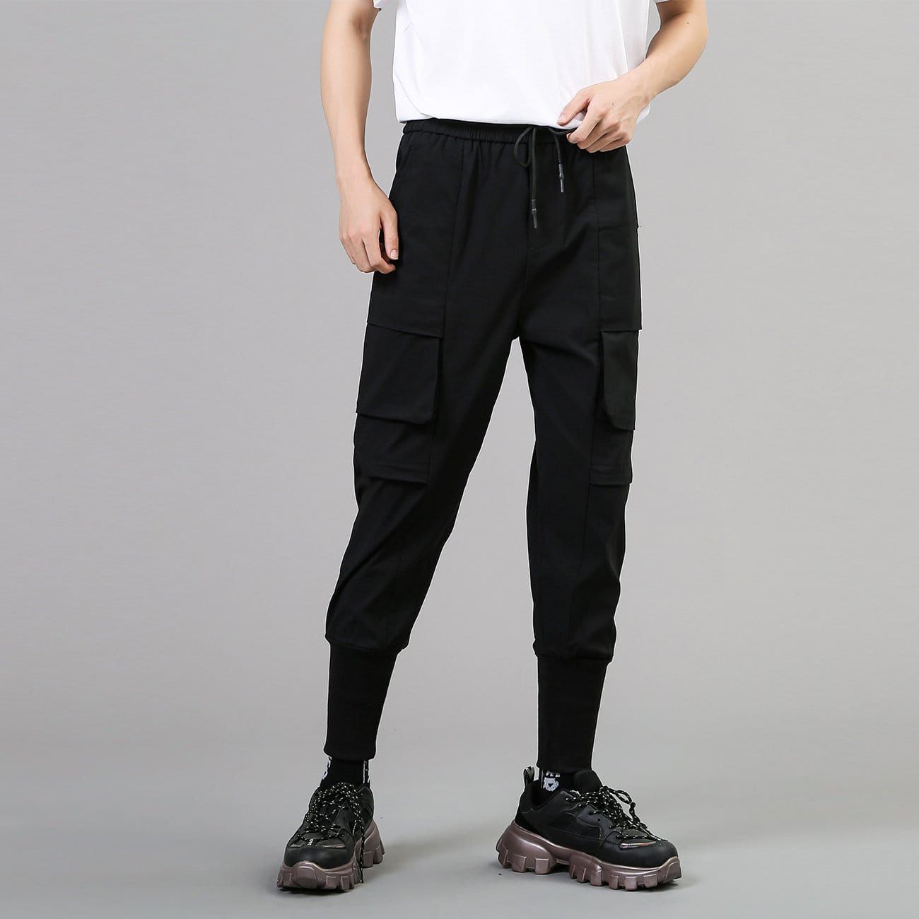 Dark Patchwork Pockets Pants sold by Yugen Theory