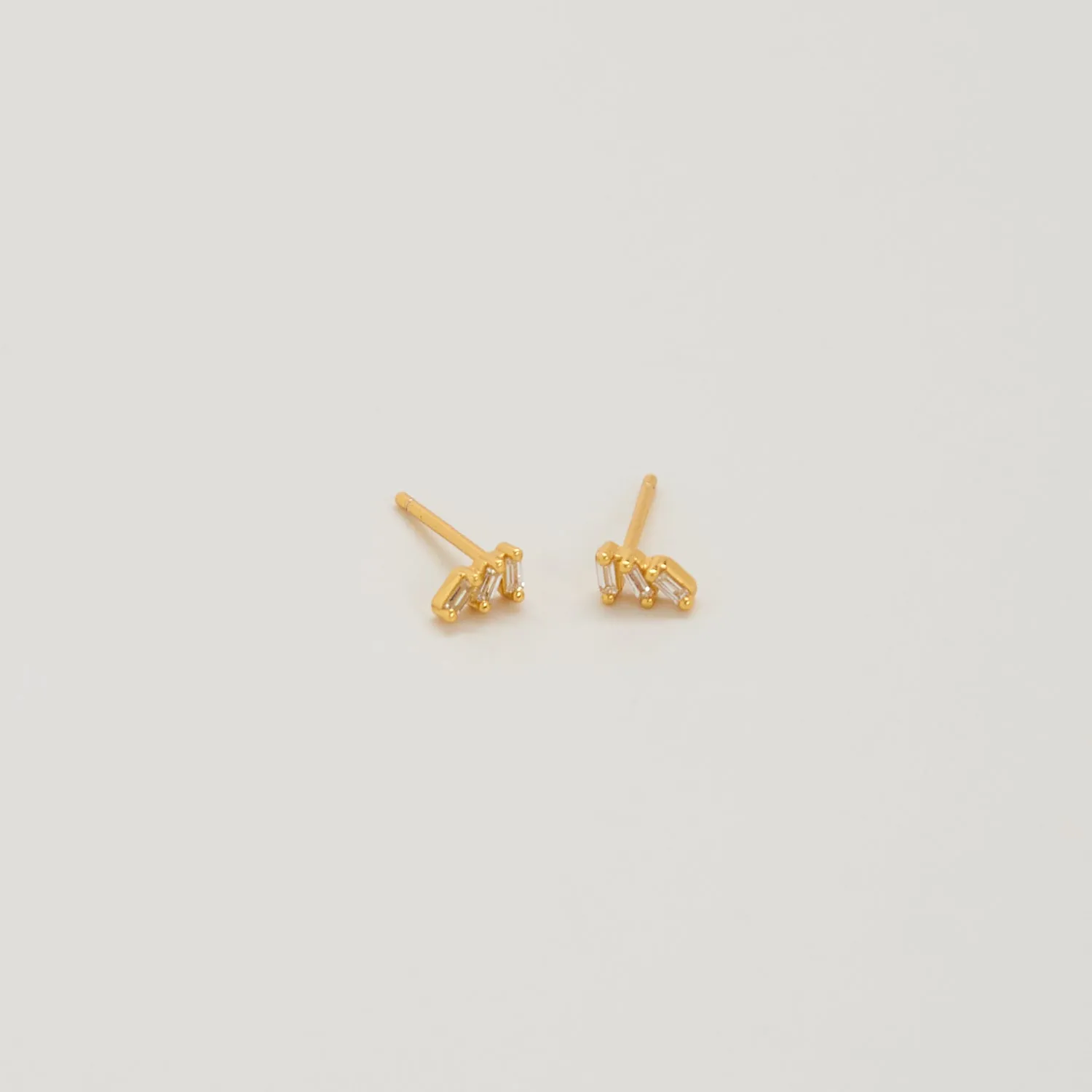 White Triple Baguette Gold Studs sold by Admiral Row
