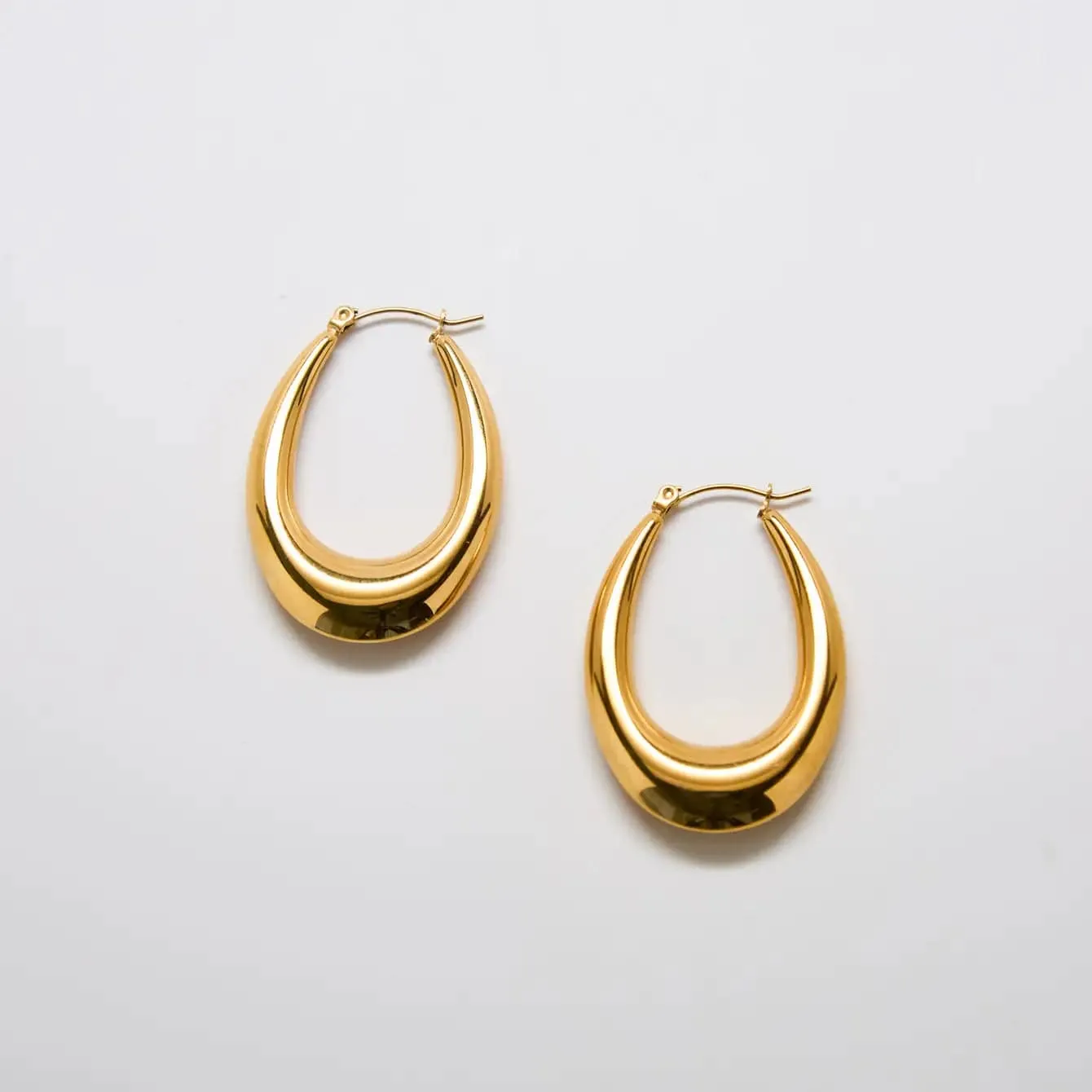 Large Gold Oval Hoop Earrings sold by Admiral Row