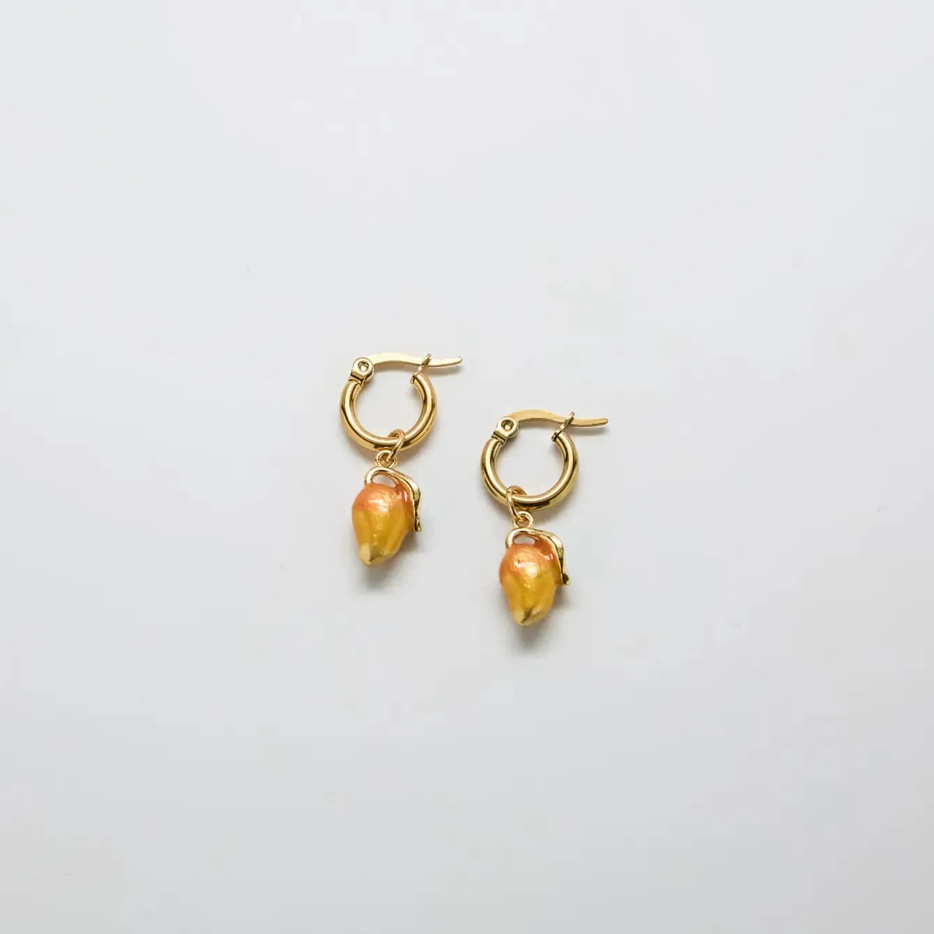 Gold Mango Huggie Hoops sold by Admiral Row