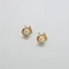 Vintage Tribal Gold and Pearl Stud Earrings sold by Admiral Row