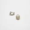 Vintage Silver Textured Oval Earrings sold by Admiral Row