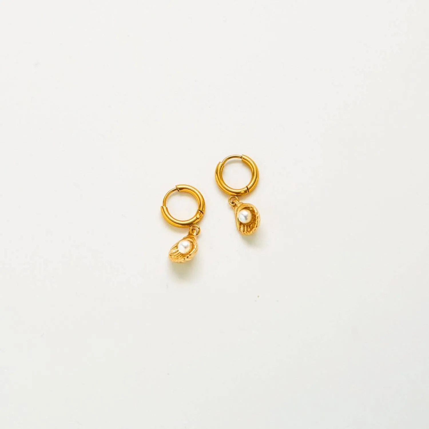 Pearl Shell Huggie Earrings sold by Admiral Row