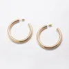 Medium Gold Hoop Earrings - Imperfect sold by Admiral Row