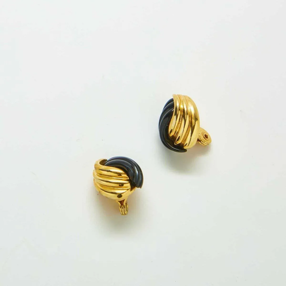 Vintage Monet Black and Gold Swirl Earrings sold by Admiral Row