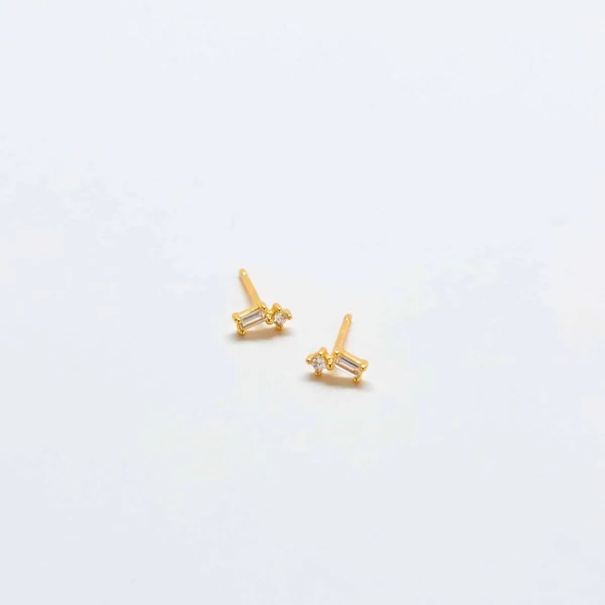 White Geo Baguette Gold Studs sold by Admiral Row