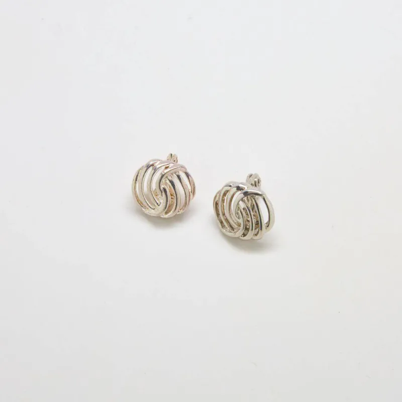 Vintage Monet Silver Swirl Earrings sold by Admiral Row