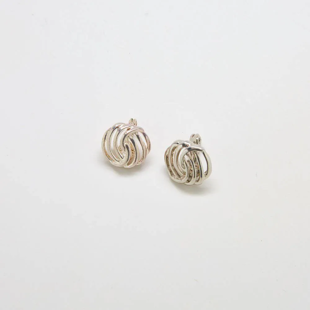 Vintage Monet Silver Swirl Earrings sold by Admiral Row