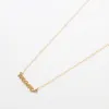MOM Gold Necklace sold by Admiral Row