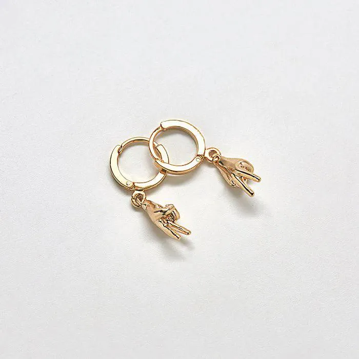 Gold Peace Huggie Earrings sold by Admiral Row product image thumbnail 3